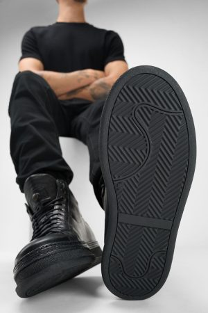 Men-wearing-COLE-black-welted-distressed-high-leather-sneakers-245063.jpg