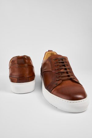 SKYE-cognac-studded-patina-leather-sneakers-SNEAKERS01429.jpg
